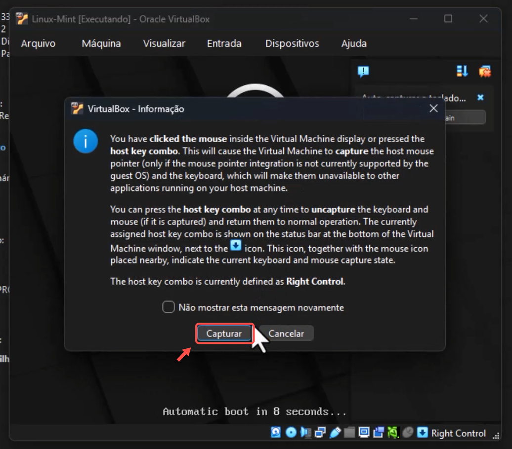 Aviso do VirtualBox sobre captura do mouse e teclado; o botão Capturar está destacado em vermelho