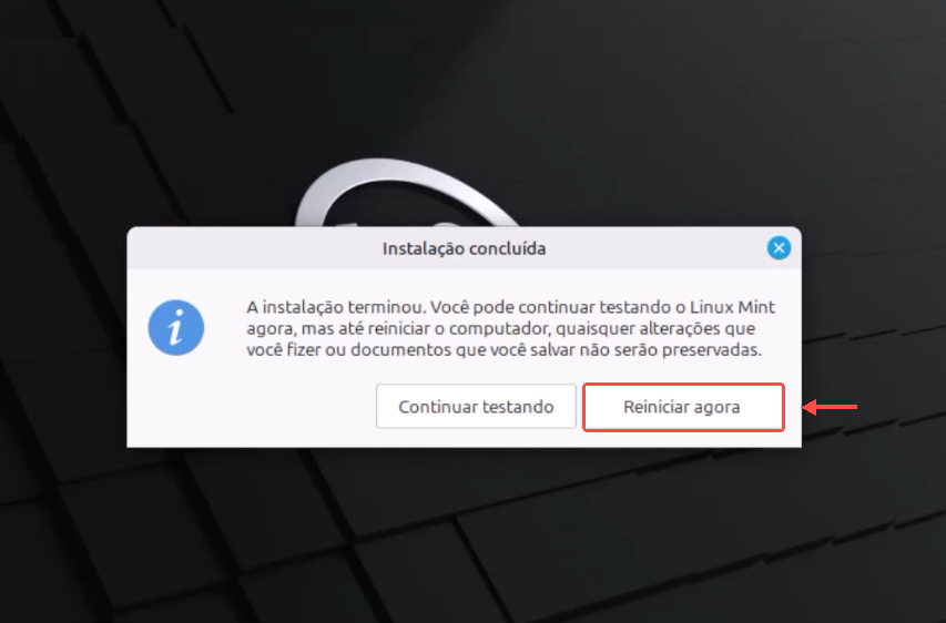 Aviso de instalação concluída do Linux Mint, com o botão Reiniciar agora destacado