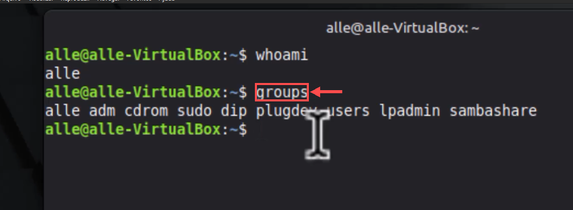 Terminal com a seta destacando o comando groups e a lista de grupos